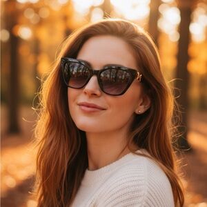 Elegant Black Sunglasses with Gold Accents